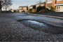 Pothole plea to resurface road and pavement in 'forgotten'...